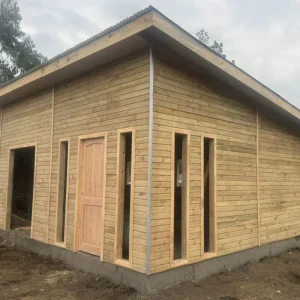 casa prefabricada techo inclinado Chile, casa prefabricada diseño moderno madera Biobío, casas prefabricadas González 54m2 techo inclinado, casa prefabricada estilo contemporáneo sur de Chile
